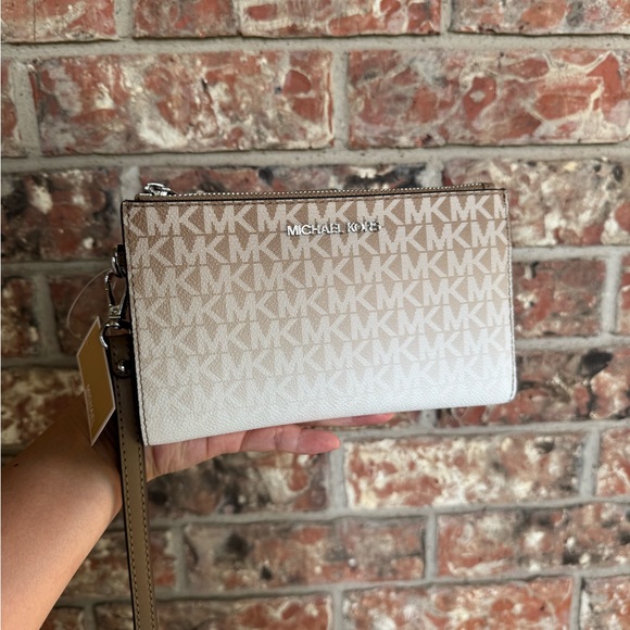 Michael Kors Handbags - Michael Kors Tan and Cream Wristlet